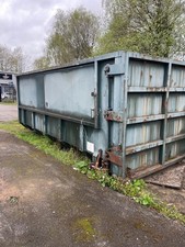 HOOK LIFT ENCLOSED SKIP ROLL